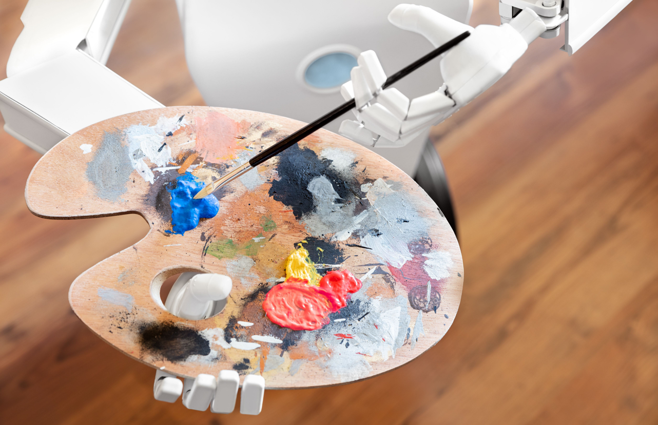 elinde palet ve fırça tutan robot
