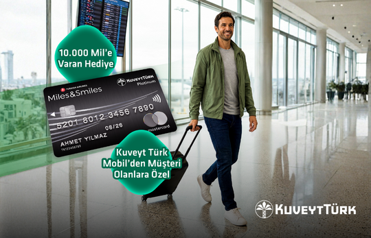 havalimanında elinde valizi olan genç adam