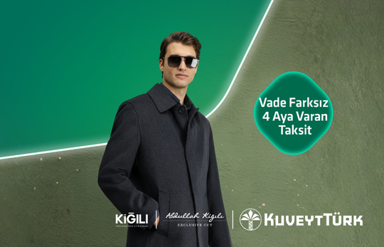 gözlüklü kaşe kabanlı genç adam