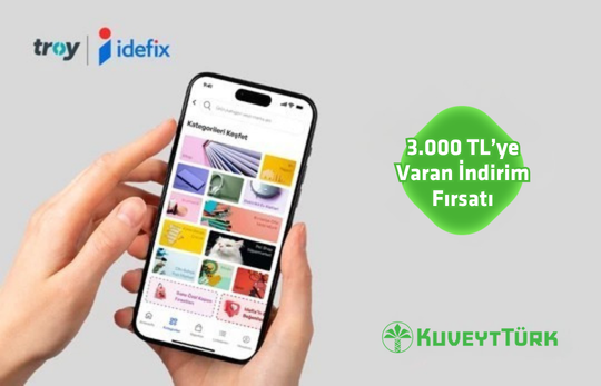 idefix mobil uyguma ekranı açık telefon tutan eller