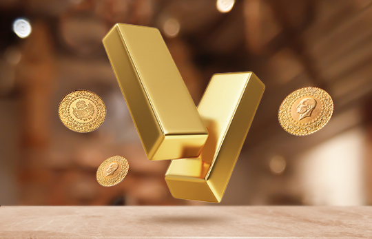 Gold bars and coins floating against a blurred background