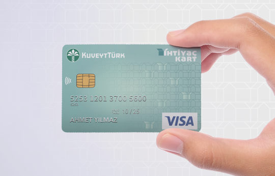 a Kuveyt Turk İhtiyaç Card held in hand