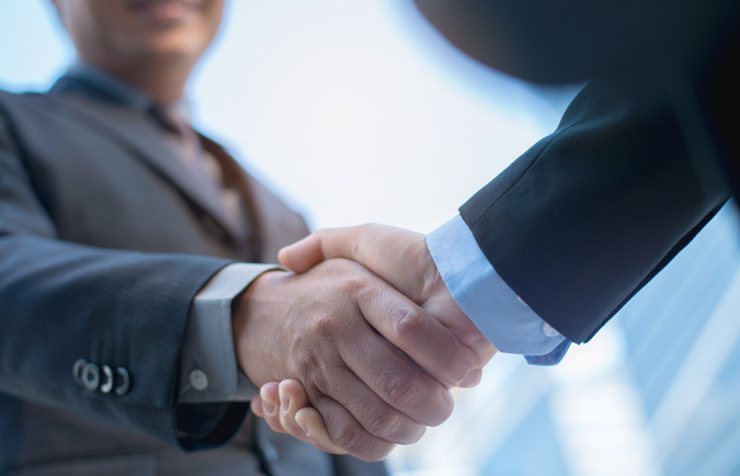business people shaking hands