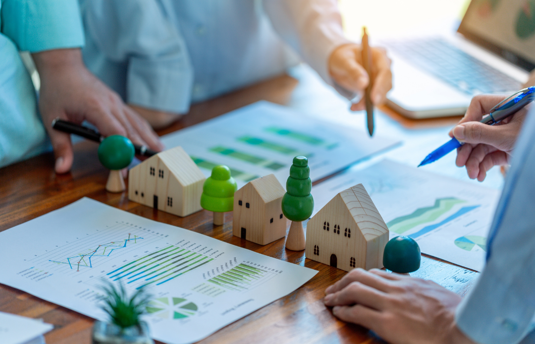 Experts working on housing finance and graphical reports