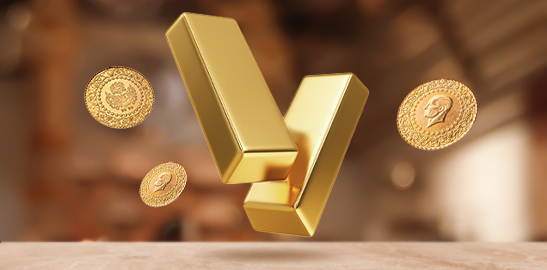 Gold bars and coins floating against a blurred background