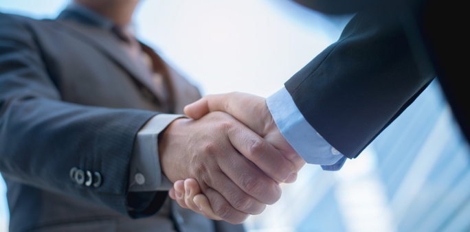 business people shaking hands