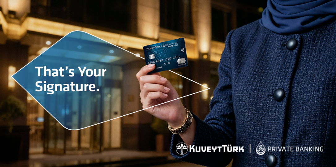 woman holding a private banking World Elite card