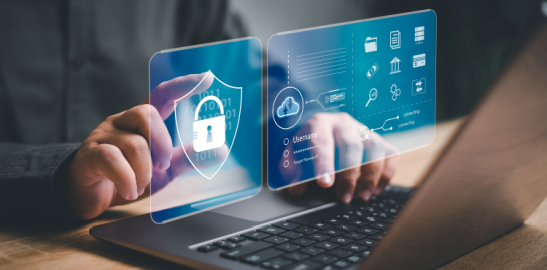 Person using laptop with digital security interface overlay