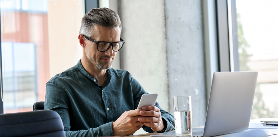 man doing banking transactions on his phone