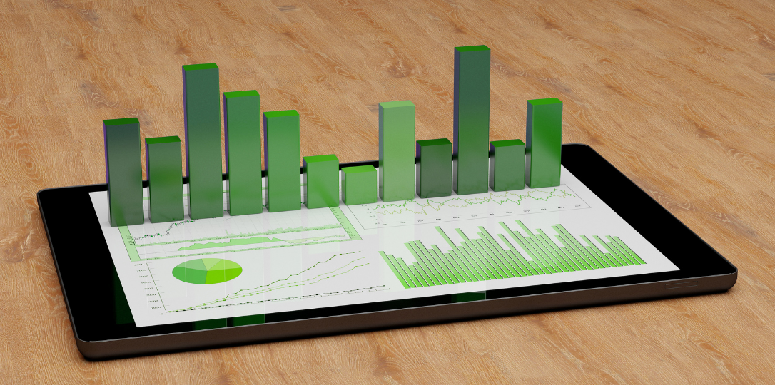 tablet display 3D bar charts and financial data graphs